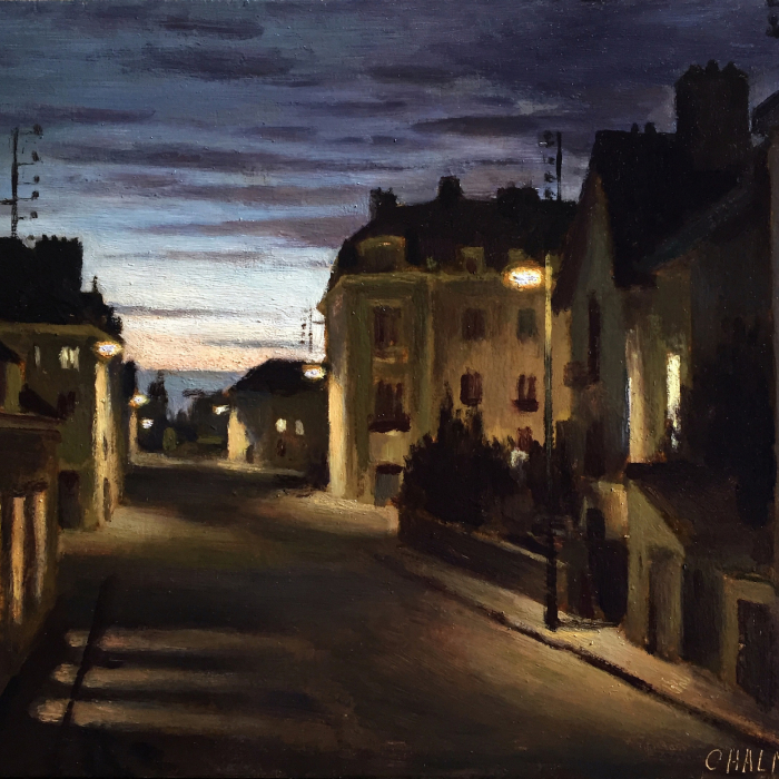 Oil on board painting of a street at dusk, both shadowed by buildings and glowing with light from their lit windows, by Marc Chalmé titled Nocturne.