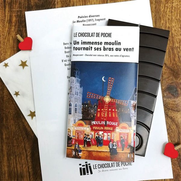 Gourmet French chocolate made by the Le Chocolat de Poche company with a wrapper showing Hugo Galerie artist Fabienne Delacroix's painting "Au Moulin Rouge."