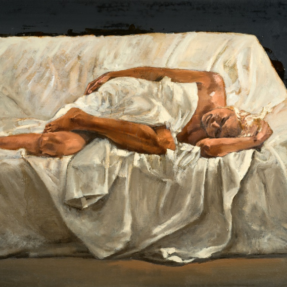 A caucasian woman with blonde hair is laying on a sofa covered in white sheets in front of a black background. she is nude and has a sheet wrapped round her torso. Oil on canvas painting by Patrick Pietropoli titled Sleeping on a Couch, oil on linen 40 x 26 inches